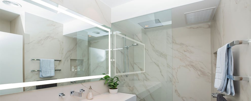 Verge lighted bathroom mirror, installed in a bathroom. Location South Yarra, Victoria, Australia. 